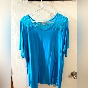 Cotton baby blue top. Super comfortable and not heavy.